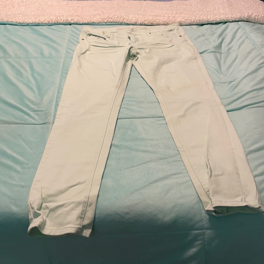 mint jeans, rips (the style), straight.